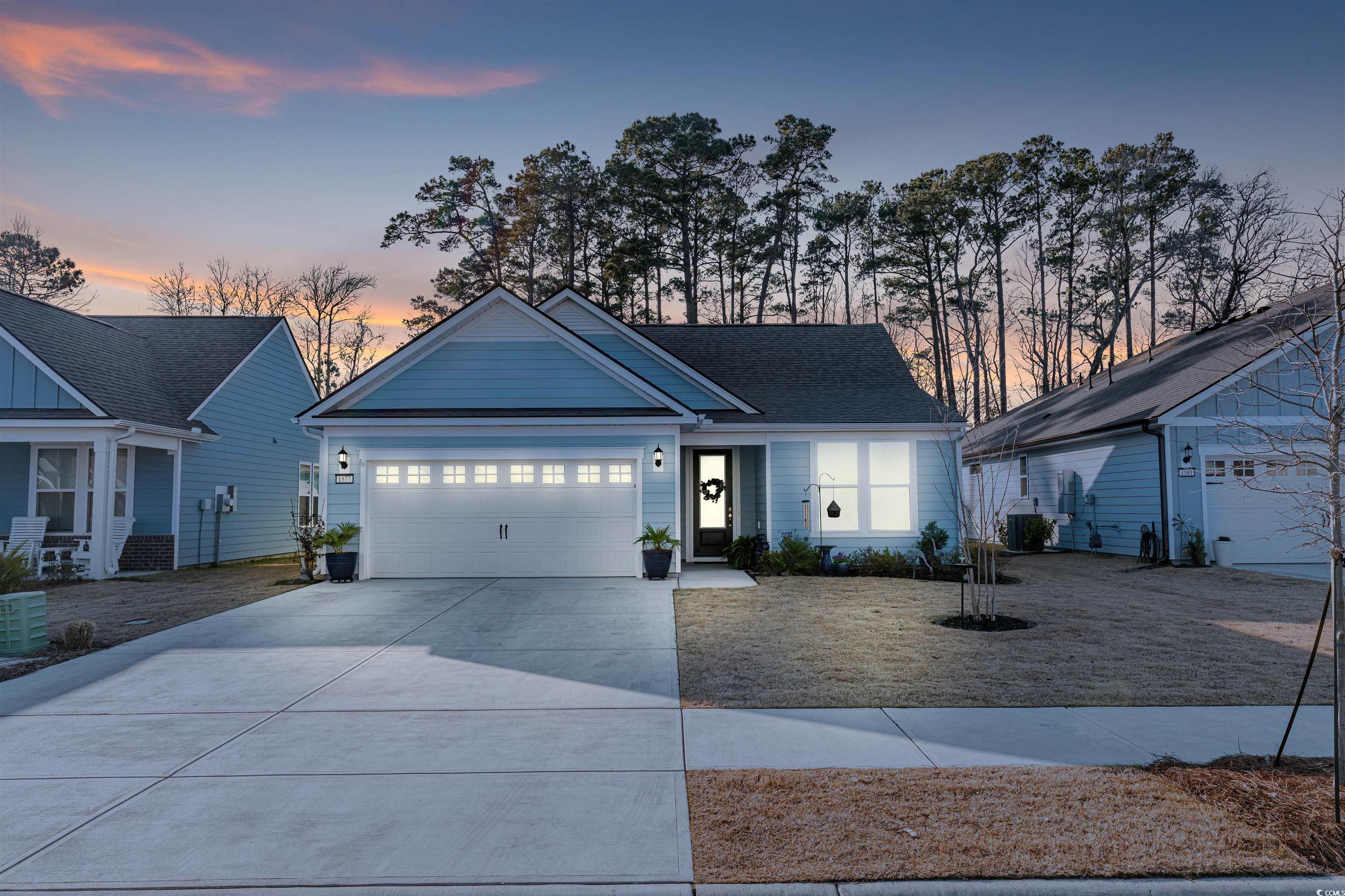 1577 Littleleaf Loop North Myrtle Beach, SC 29582 - Photo 1 of 40 View of front of property featuring driveway and a