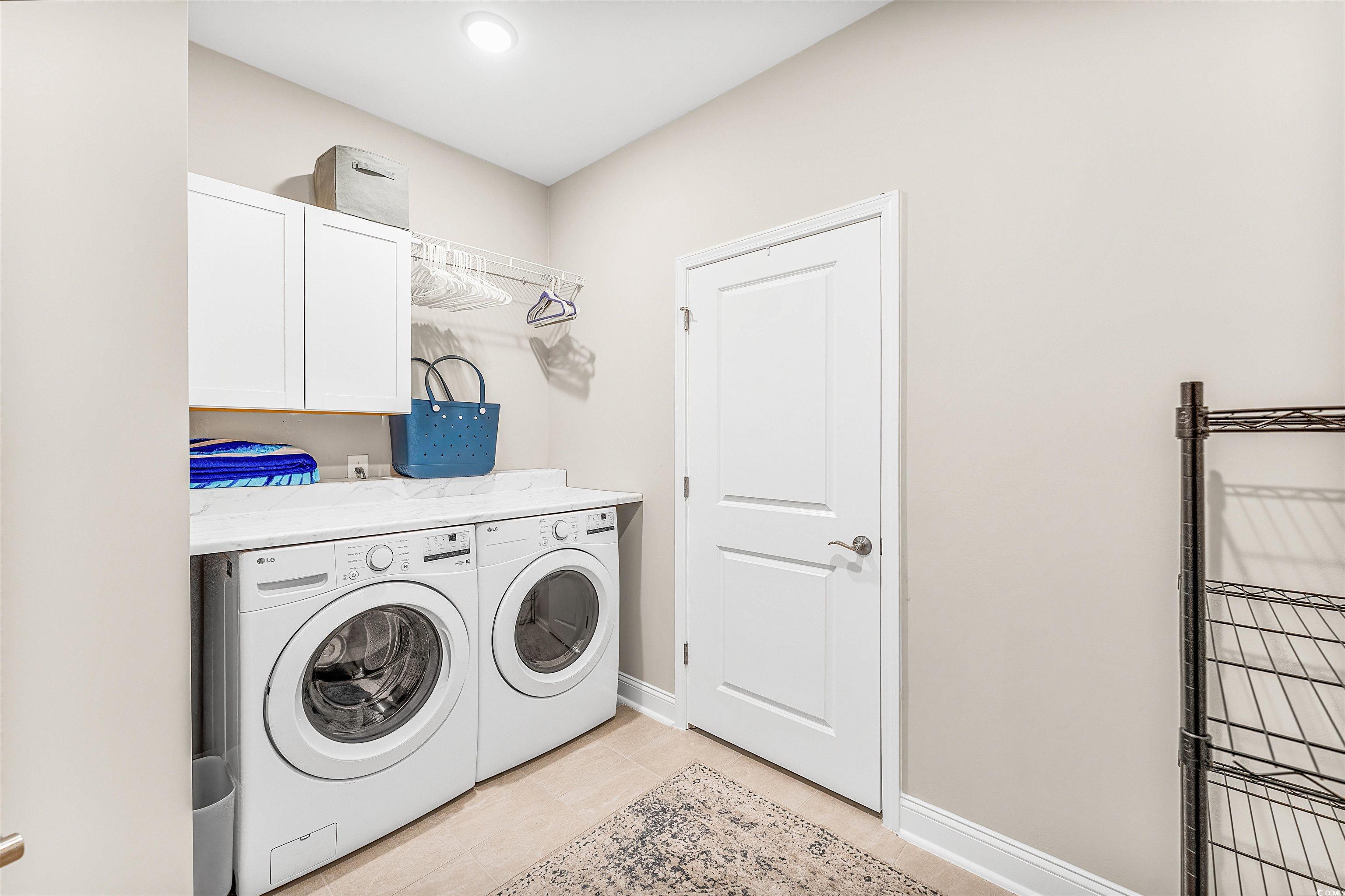 1577 Littleleaf Loop North Myrtle Beach, SC 29582 - Photo 23 of 40 Laundry area featuring baseboards, cabinet space,