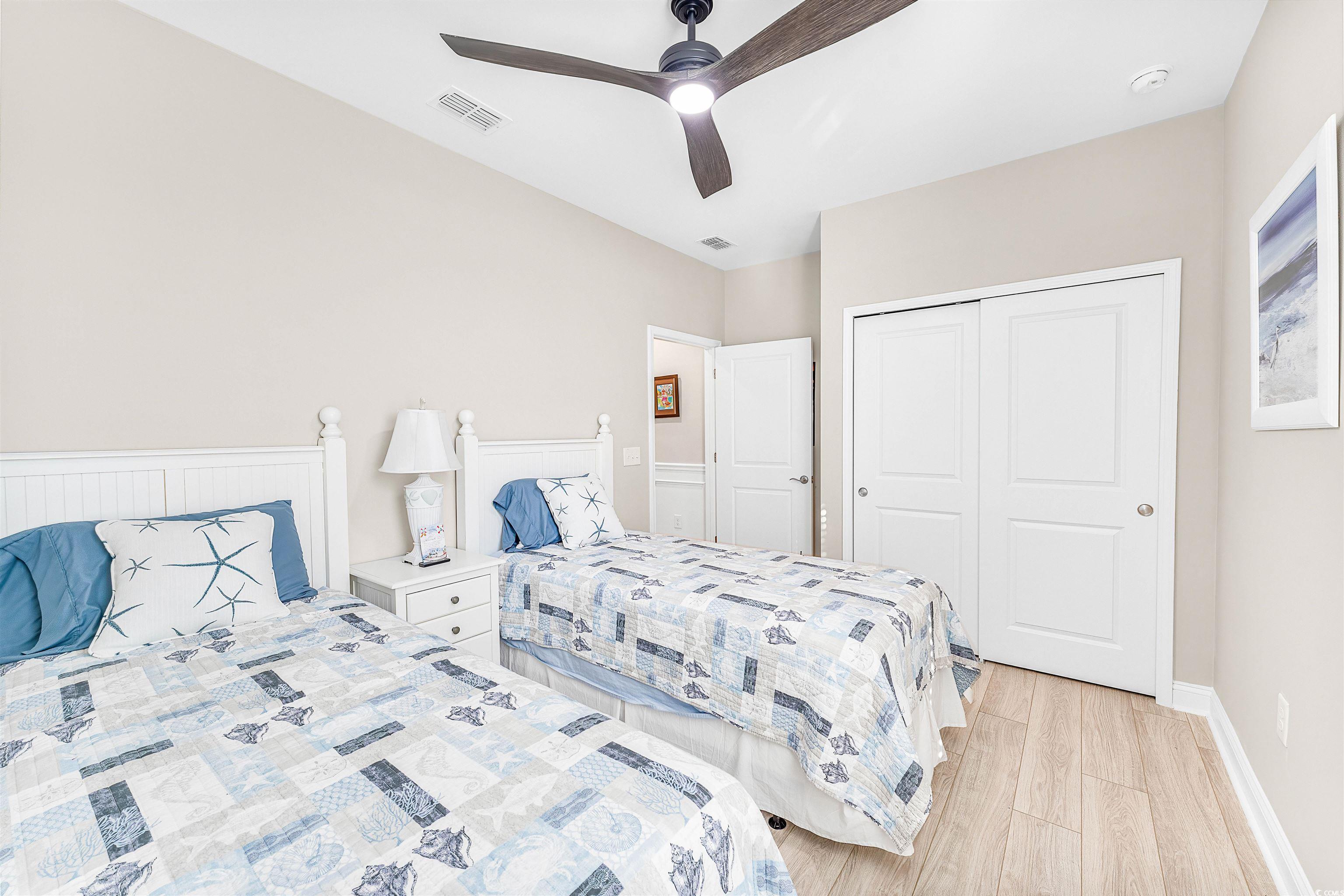 1577 Littleleaf Loop North Myrtle Beach, SC 29582 - Photo 26 of 40 Bedroom featuring a closet, baseboards, light wood