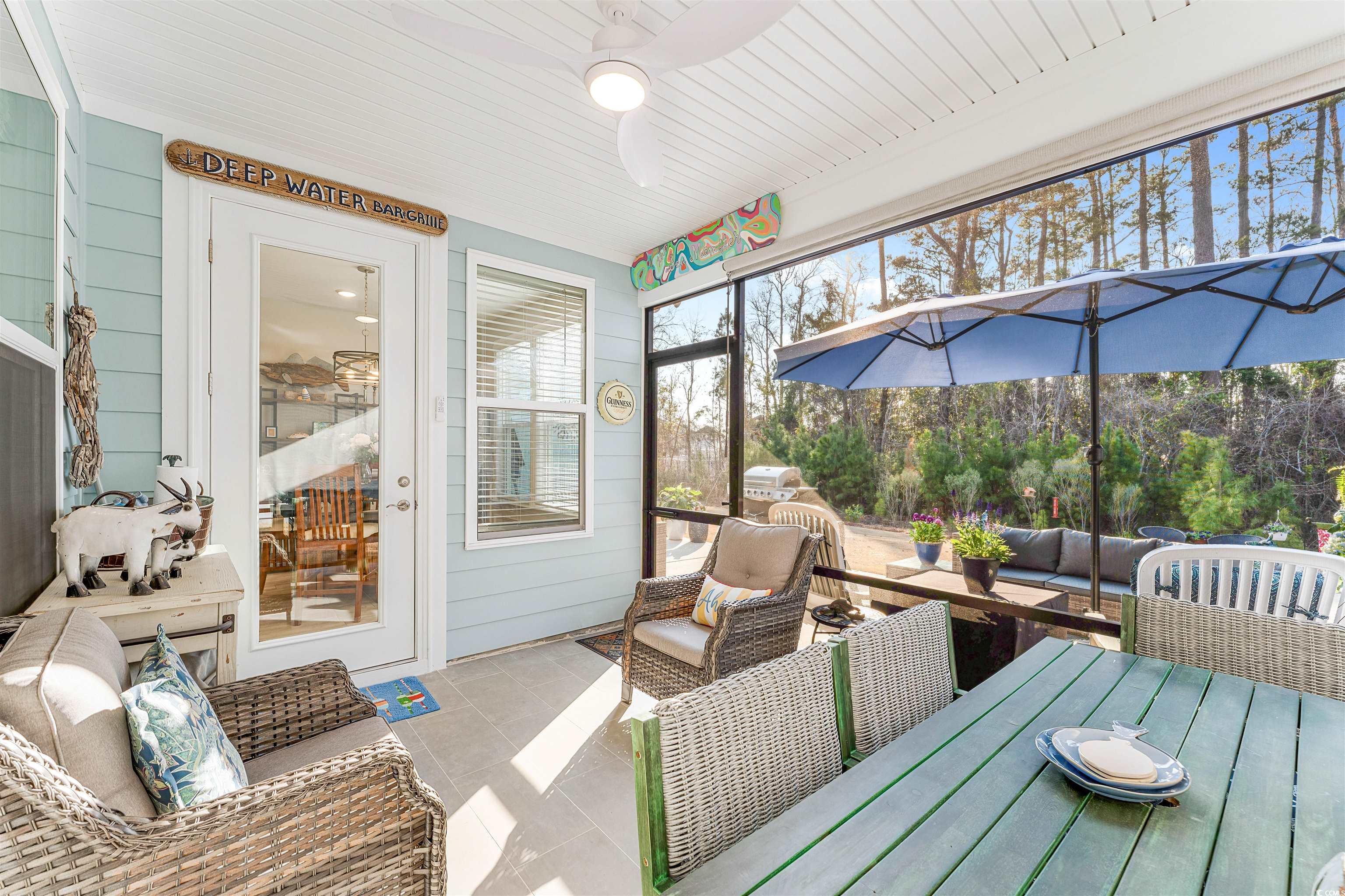 1577 Littleleaf Loop North Myrtle Beach, SC 29582 - Photo 27 of 40 Sunroom with outdoor lounge area