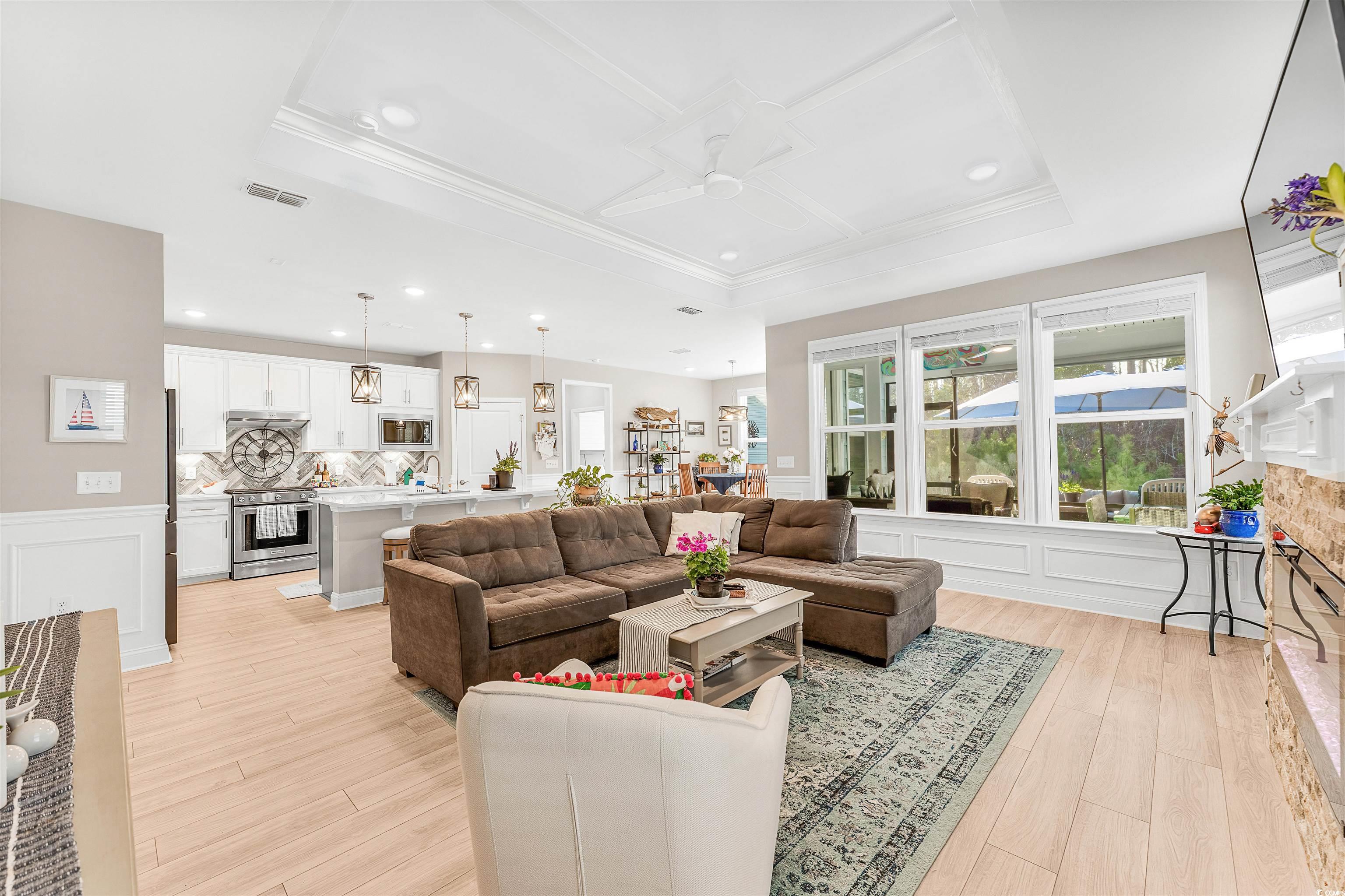 1577 Littleleaf Loop North Myrtle Beach, SC 29582 - Photo 8 of 40 Living area featuring a ceiling fan, light wood-st