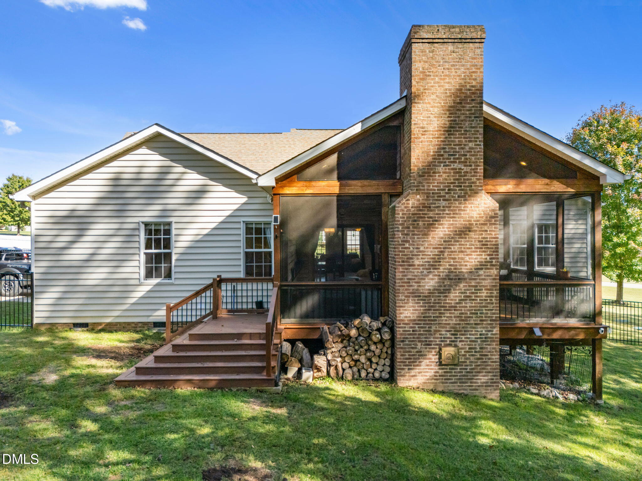 236 Derwin Drive Timberlake, NC 27583 - Photo 4 of 45 a backyard of a house with table and chairs