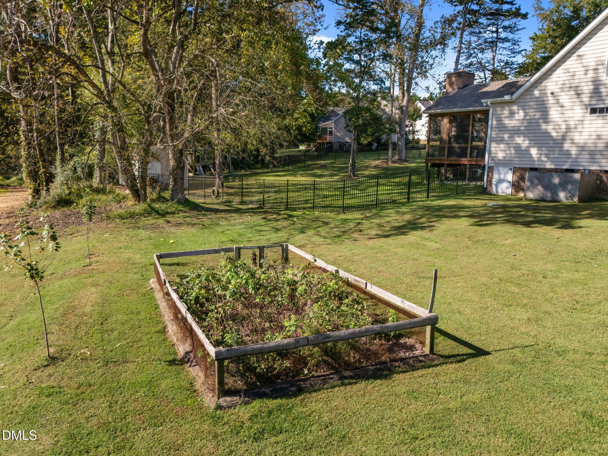 236 Derwin Drive Timberlake, NC 27583 - Photo 8 of 45 a view of a swimming pool with a patio
