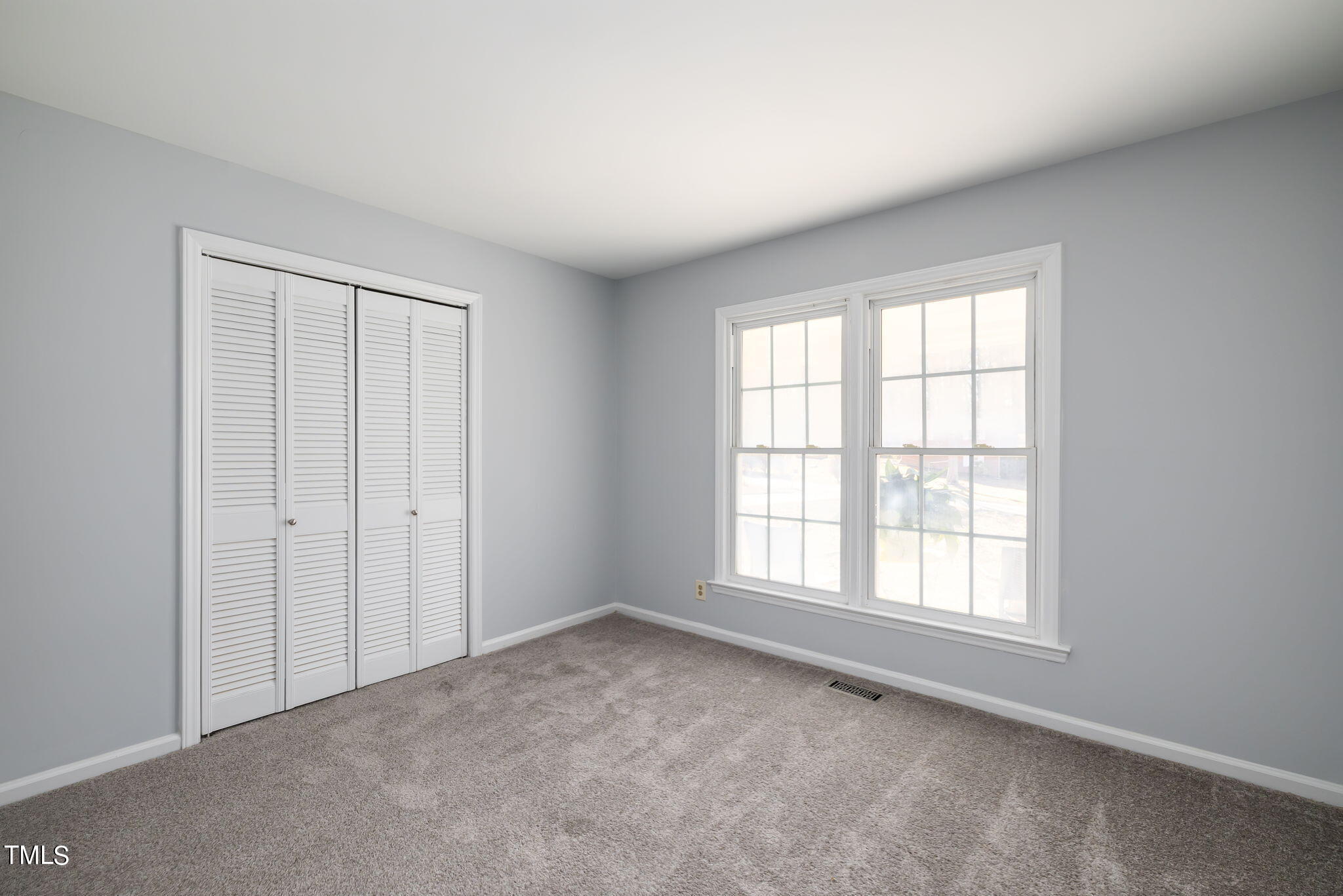 717 Bayard Road Durham, NC 27703 - Photo 18 of 30 Secondary Bedroom with new carpet.