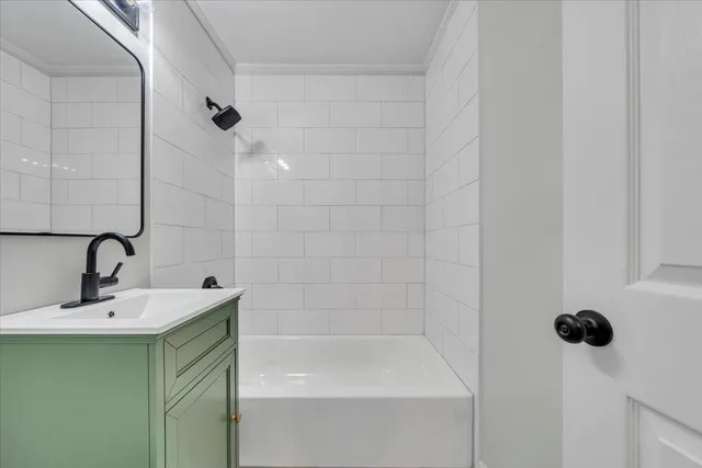a bathroom with a sink and a bathtub
