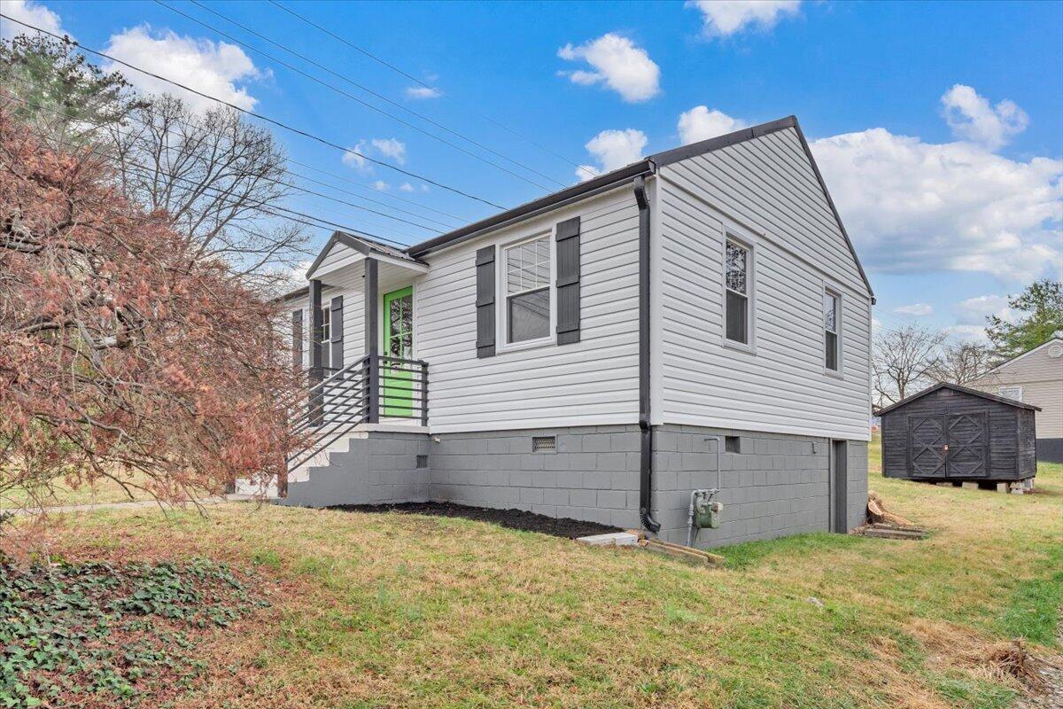 1004 26th Street Southwest Roanoke, VA 24015 - Photo 26 of 27 a view of a house with a yard