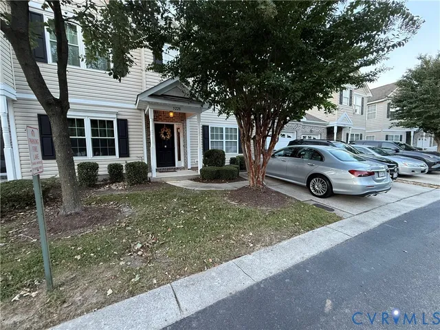 a car parked in front of a house