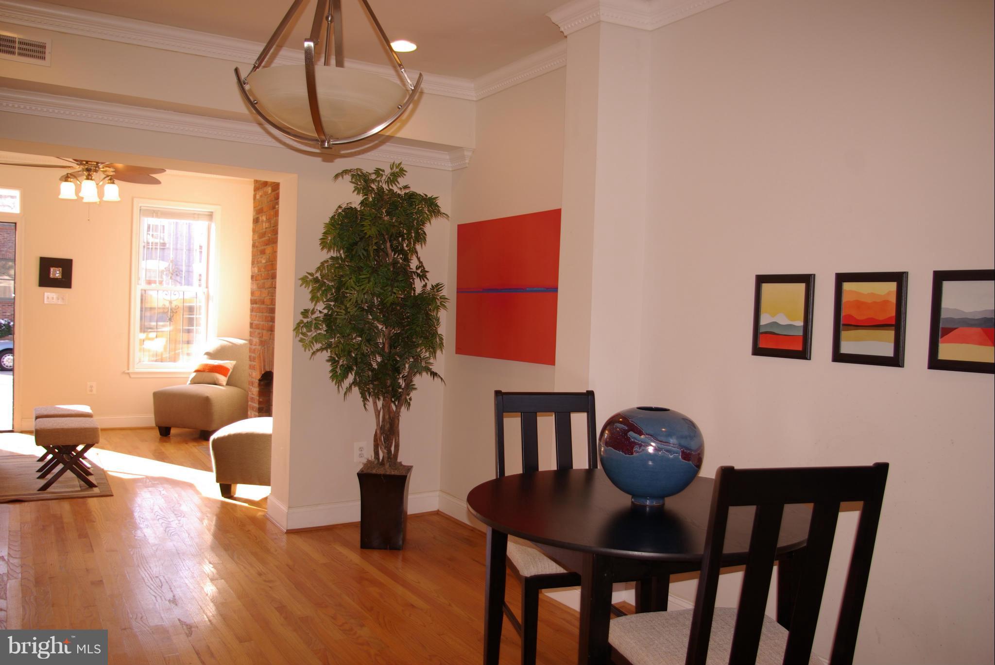 318 11th Street Southeast Washington, DC 20003 - Photo 6 of 26 a living room with furniture and wooden floor