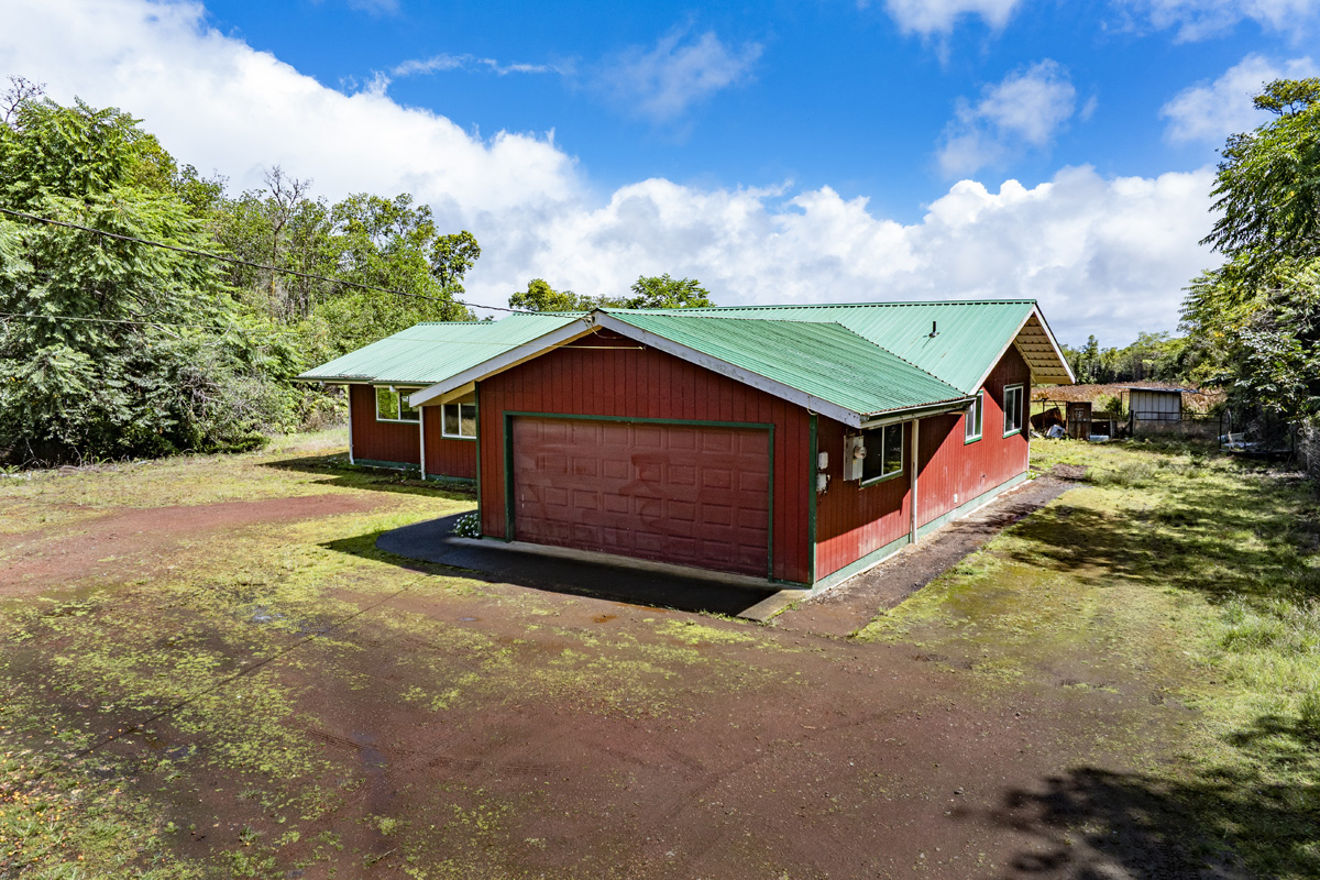 a view of house with backyard and entertaining space