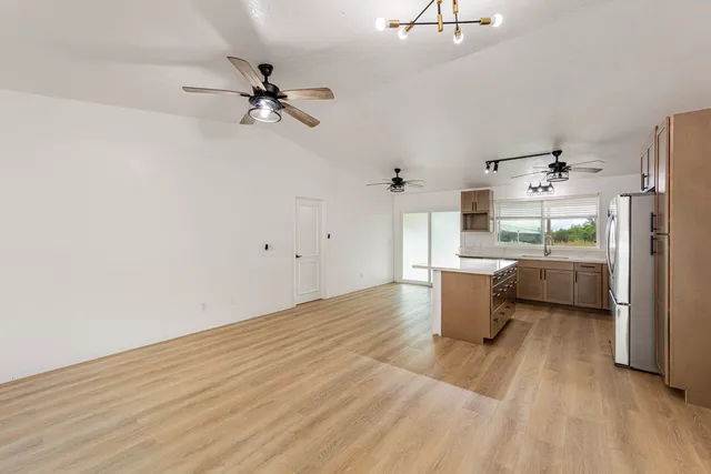 a view of a kitchen with a sink and dishwasher