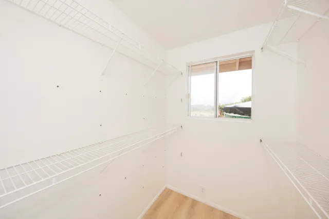 a view of a window in an empty room