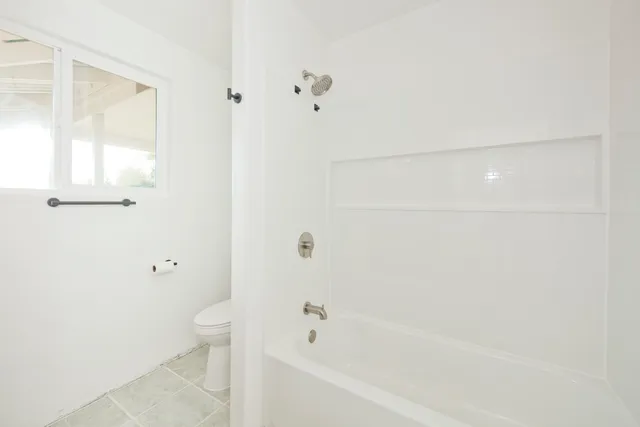 a bathroom with a bathtub