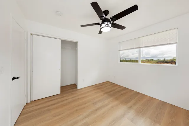 a view of a big room with wooden floor
