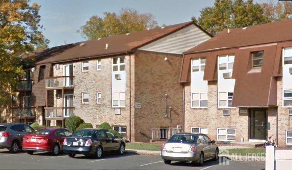 a car parked in front of a building