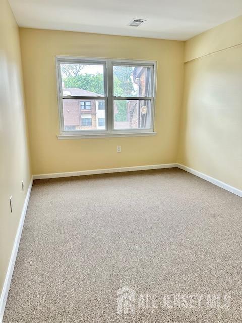 1730 Raspberry Court Edison, NJ 08817 - Photo 5 of 5 a view of an empty room with a window