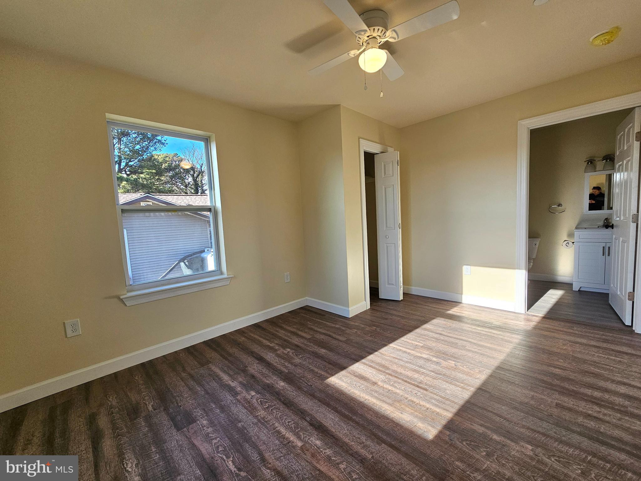 26404 Franklin Road Crisfield, MD 21817 - Photo 11 of 31 a view of a room with wooden floor and window