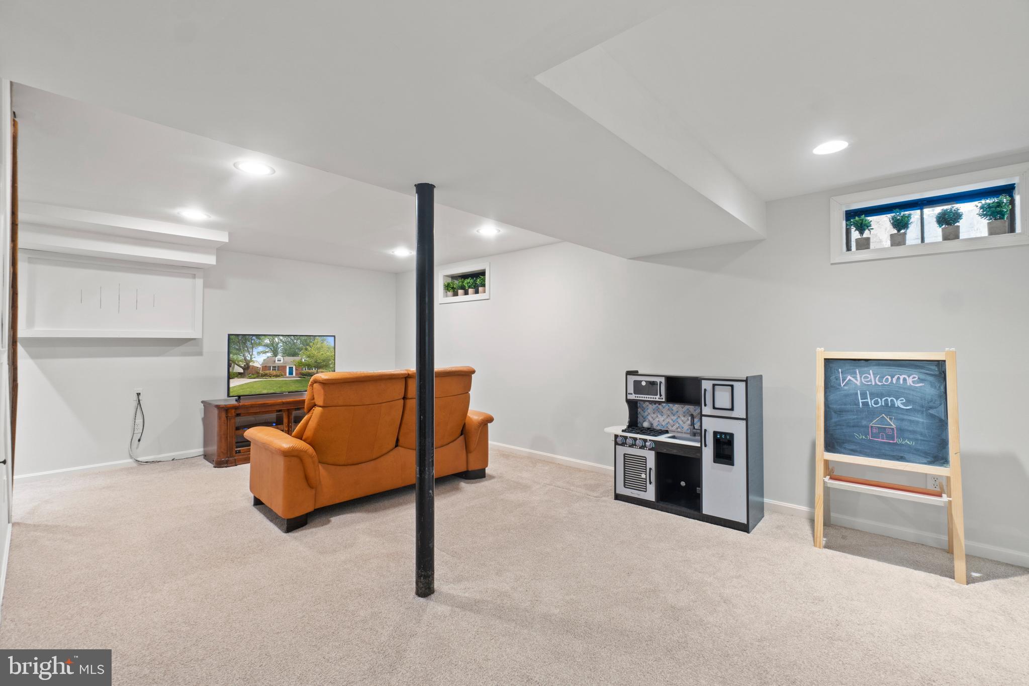 8821 Sundale Drive Silver Spring, MD 20910 - Photo 20 of 27 a living room with furniture and kitchen view