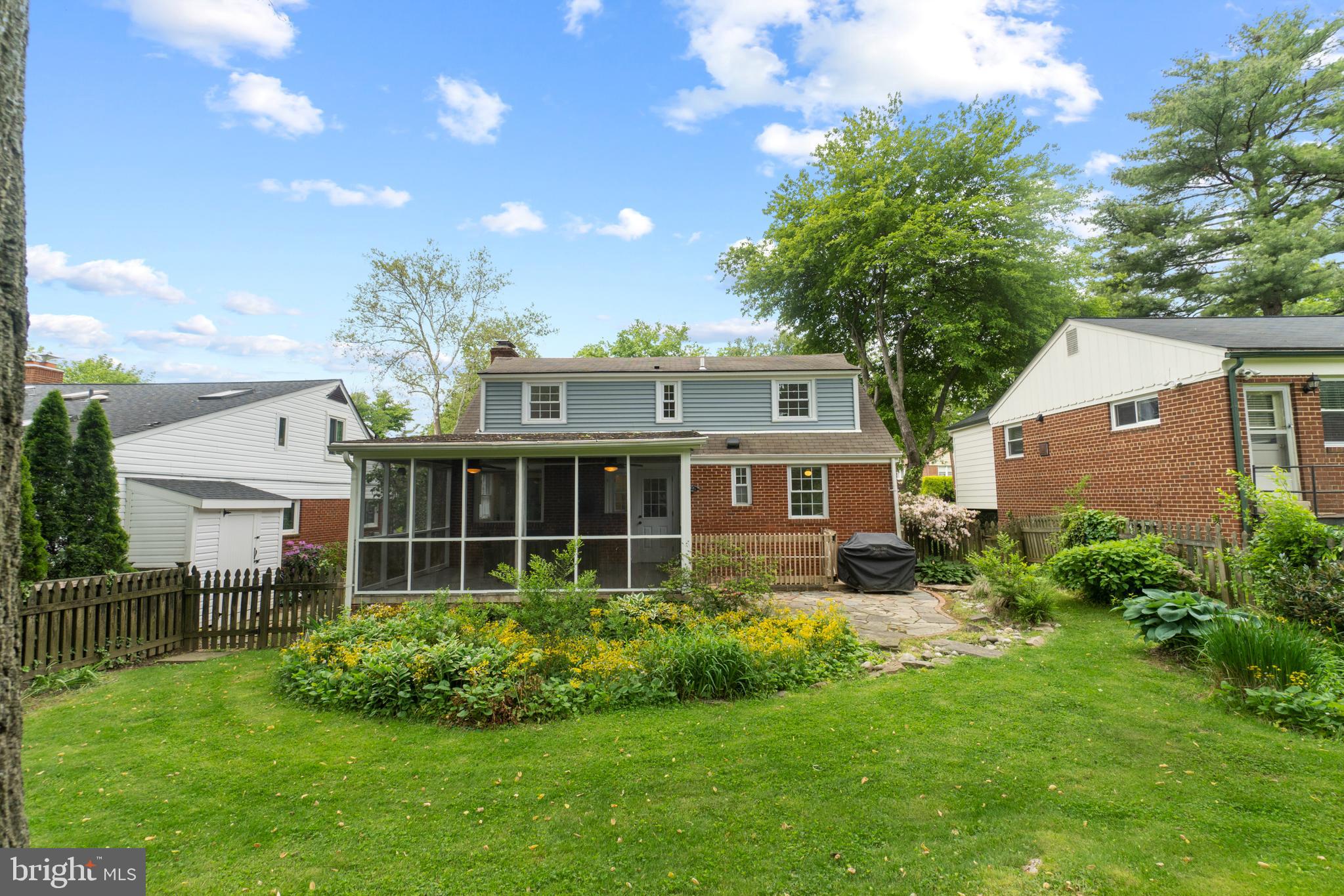 8821 Sundale Drive Silver Spring, MD 20910 - Photo 26 of 27 a view of a house with a garden
