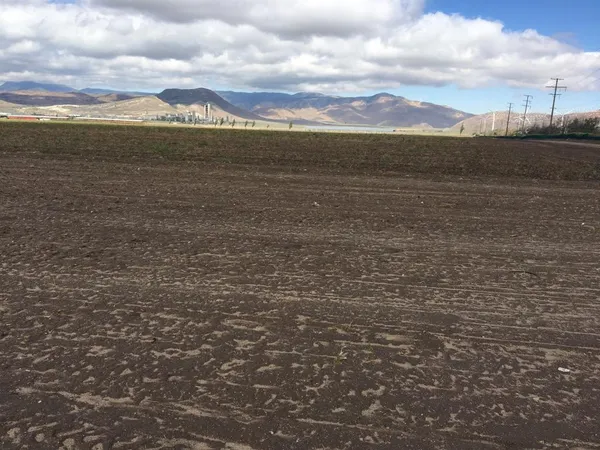 a view of a lake with a big yard
