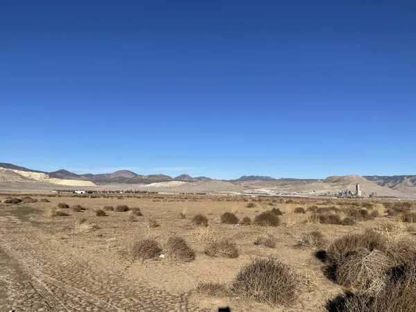 a view of a lake with a yard