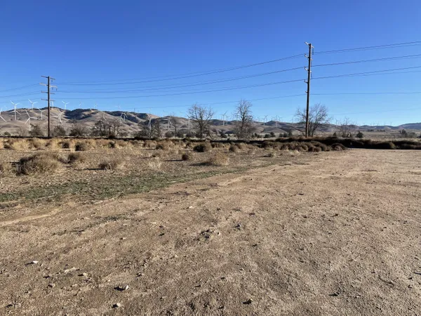 a view of mountain view with mountains in the background