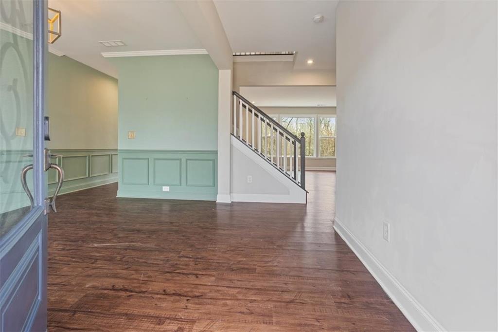 129 Rex Avenue Canton, GA 30114 - Photo 2 of 66 a view of a hallway with wooden floor