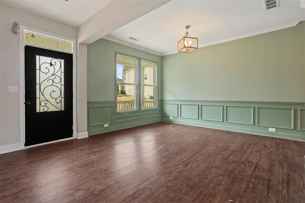 129 Rex Avenue Canton, GA 30114 - Photo 3 of 66 an empty room with windows and closet