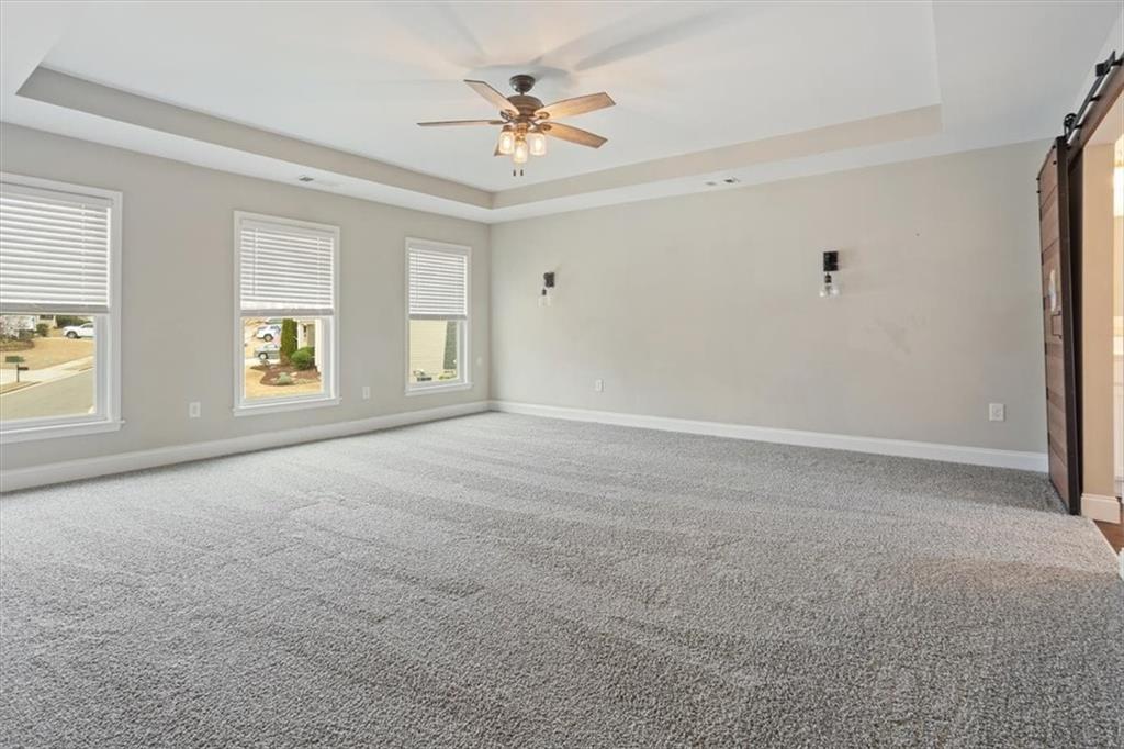 129 Rex Avenue Canton, GA 30114 - Photo 31 of 66 a view of an empty room with a window