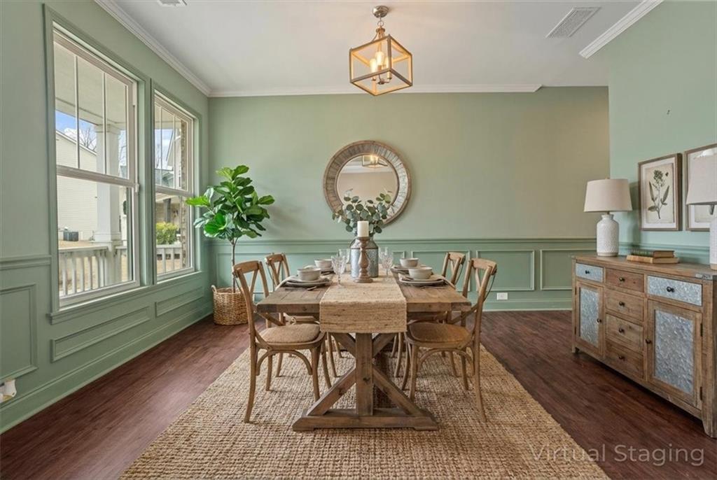 129 Rex Avenue Canton, GA 30114 - Photo 4 of 66 a view of a dining room with furniture window and wooden floor