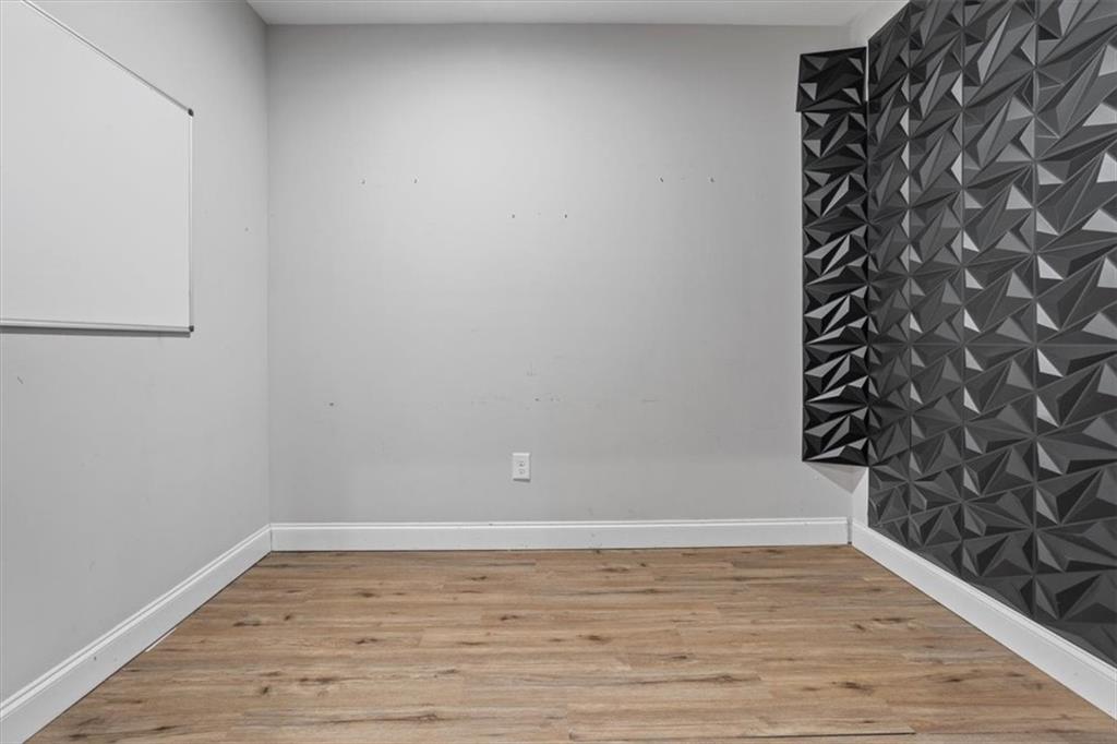 129 Rex Avenue Canton, GA 30114 - Photo 50 of 66 a view of a small space with wooden floor