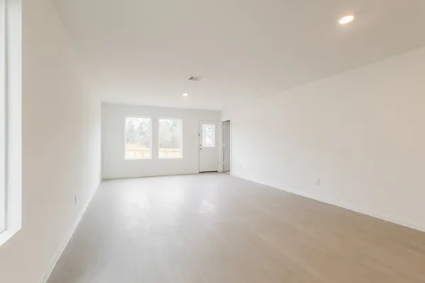 an empty room with windows