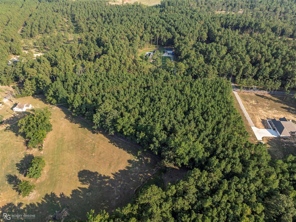 190 Linton Bellevue Road Benton, LA 71006 - Photo 6 of 13 an aerial view of a house with a yard and lake view