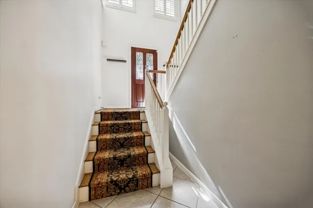 a view of entryway with stairs