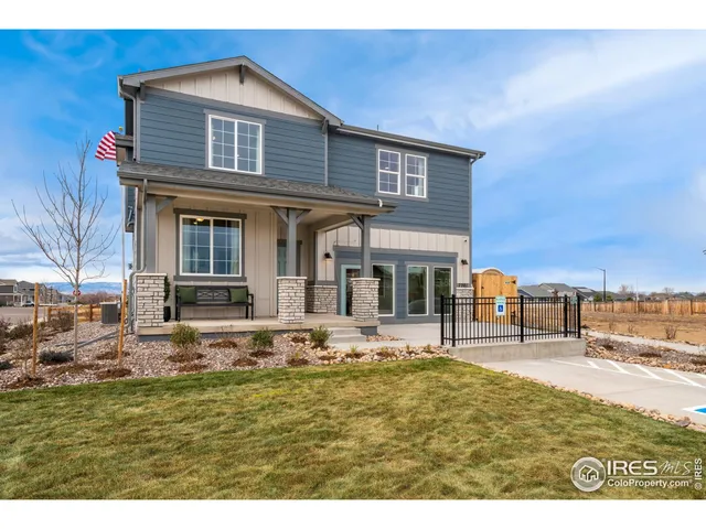 a house view with swimming pool and porch