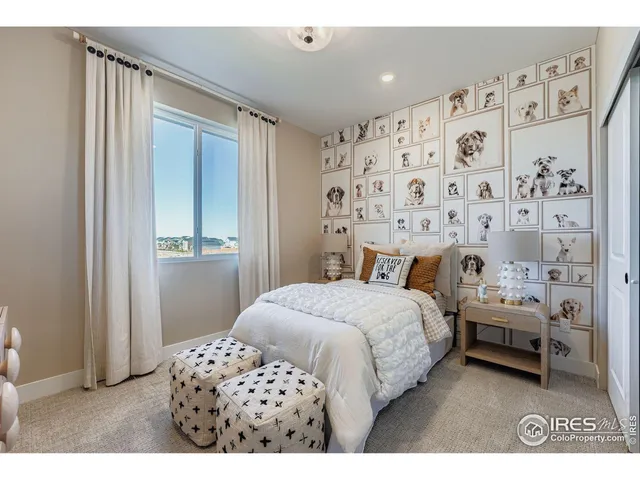 a bedroom with a bed and a view of bathroom