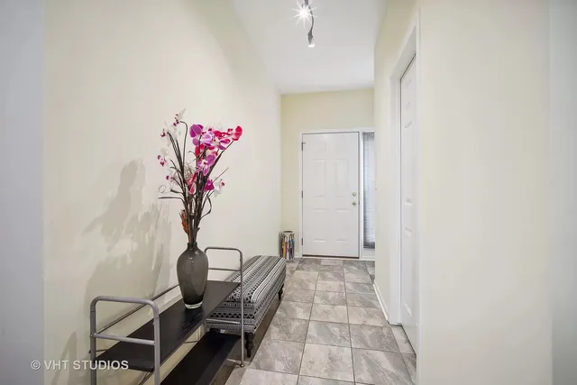 a view of a hallway with workspace