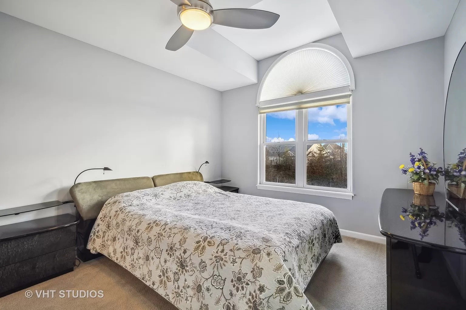 23540 North Melody Lane Lake Zurich, IL 60047 - Photo 20 of 35 a bedroom with a bed and a chandelier