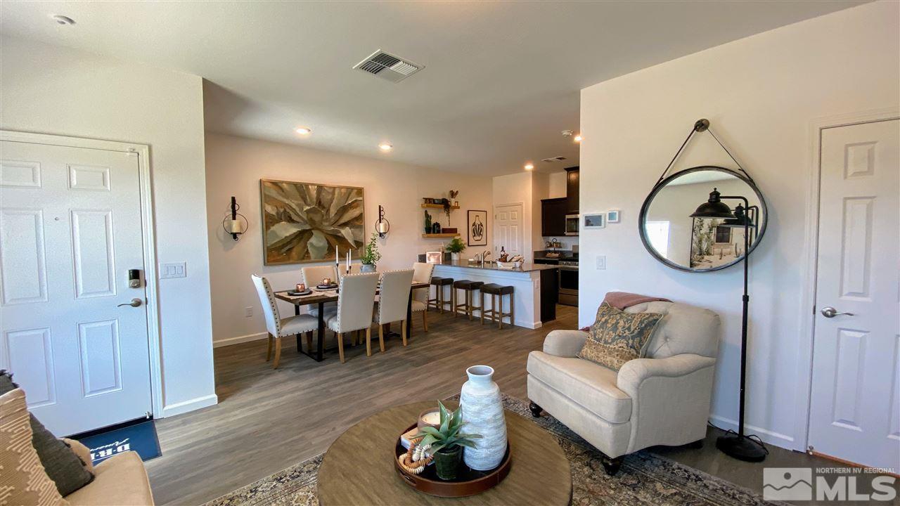 400 Autumn Breeze Circle, Unit LOT #1 Reno, NV 89511 - Photo 4 of 23 a living room with furniture a rug and a window