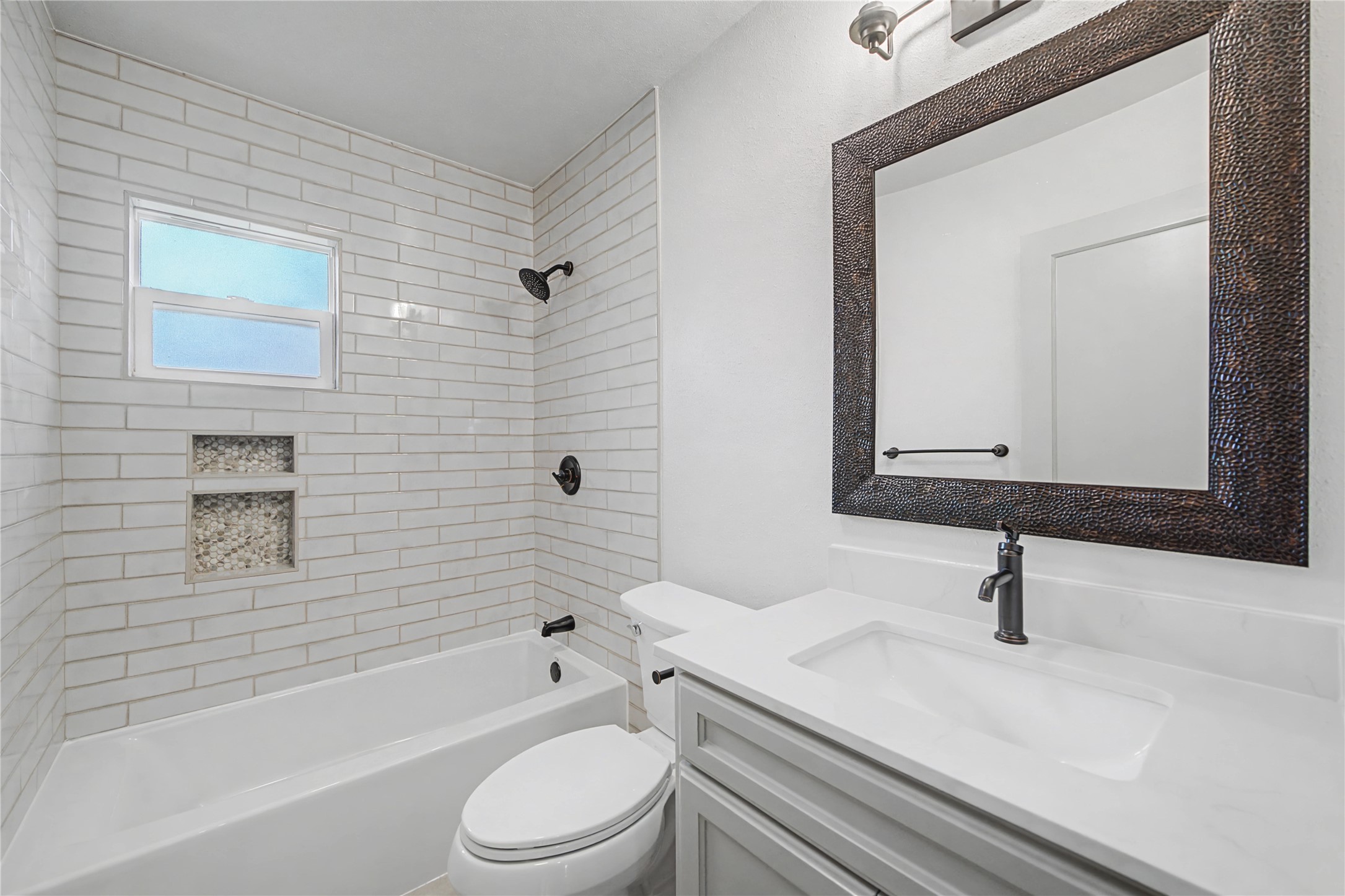 1108 Nottingham Drive Angleton, TX 77515 - Photo 13 of 27 a bathroom with a sink a toilet and shower