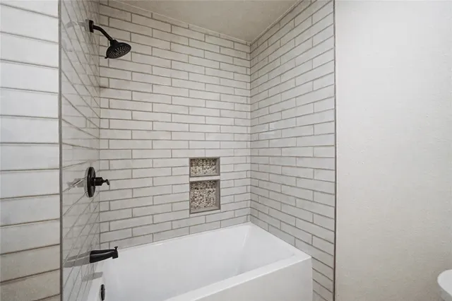 a bathroom with a bathtub