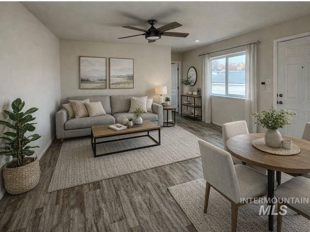 Living room with ceiling fan, wood finished floors, and recessed lighting