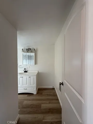 a view of room and bathroom