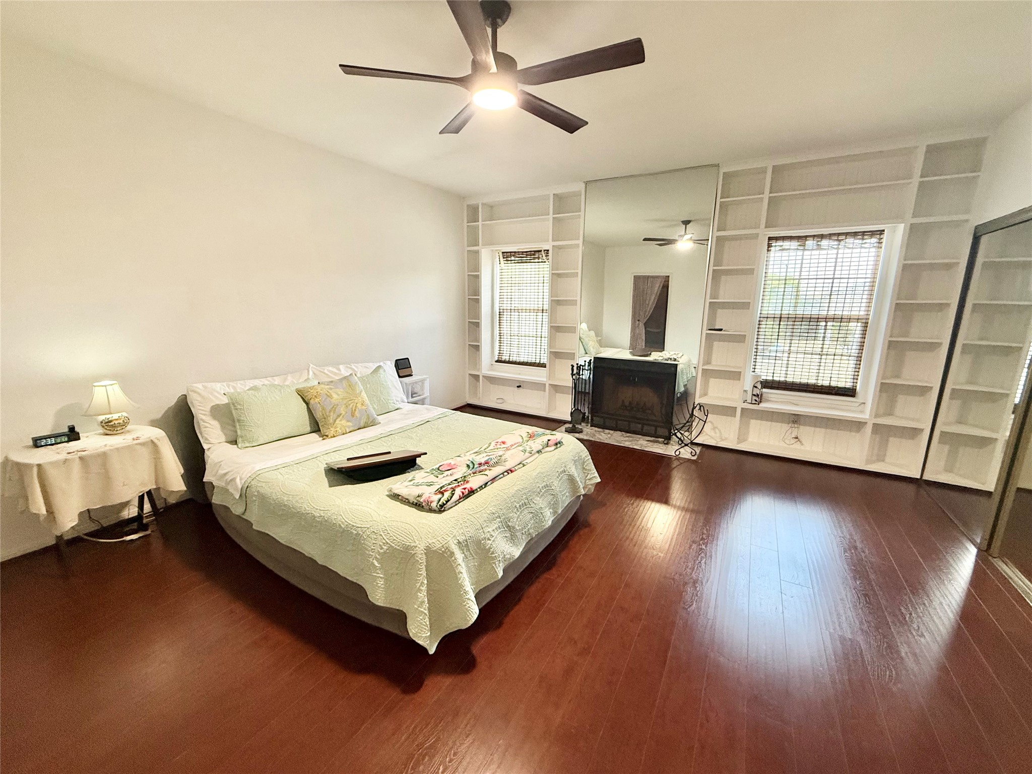 6000 Reims Road, Unit 3010 Houston, TX 77036 - Photo 12 of 28 Primary Bedroom with a cozy fireplace