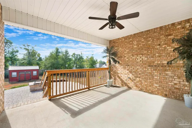 a view of balcony with wooden floor