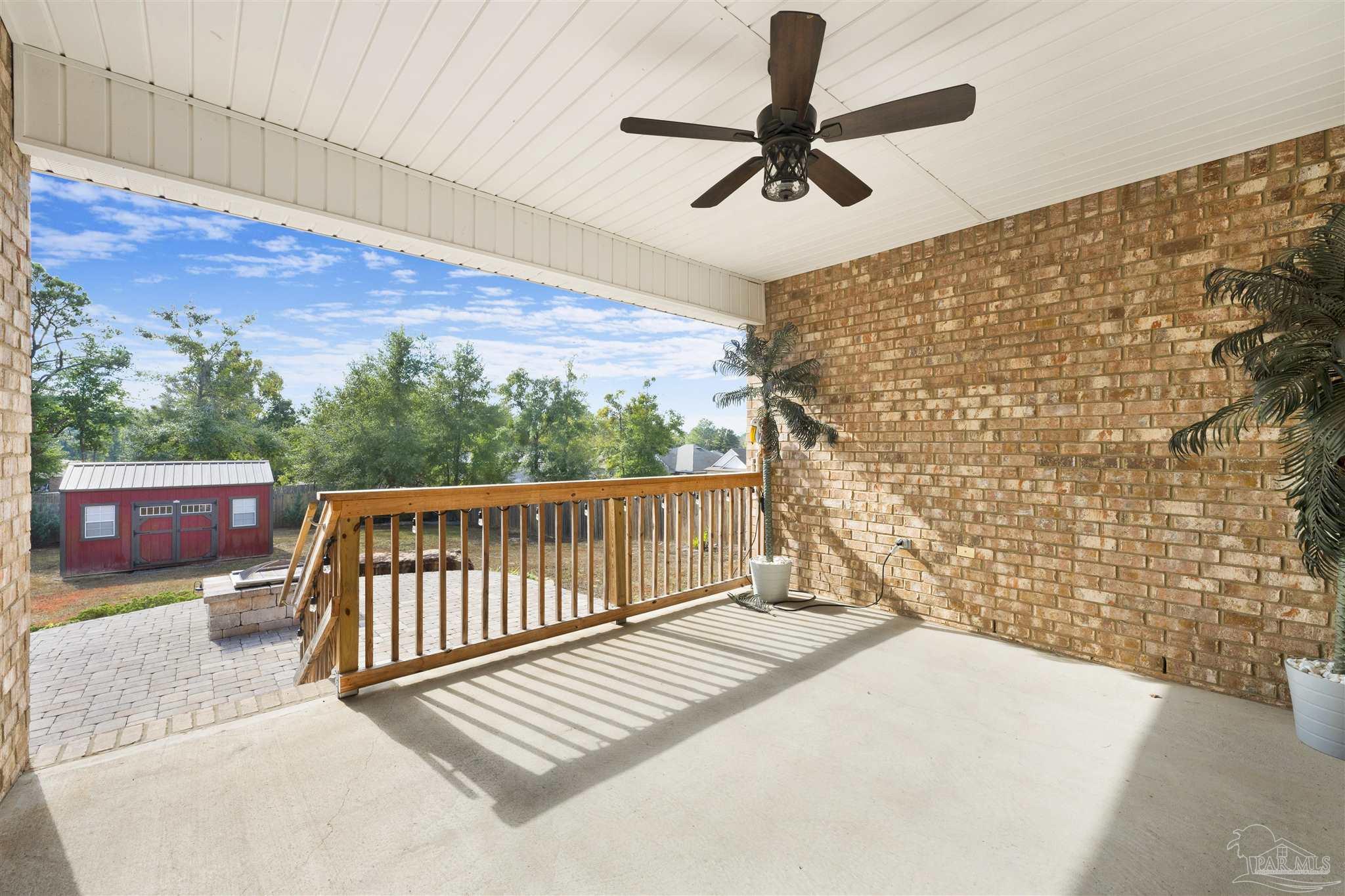 7907 Majestic Cypress Drive Milton, FL 32583 - Photo 29 of 36 a view of balcony with wooden floor