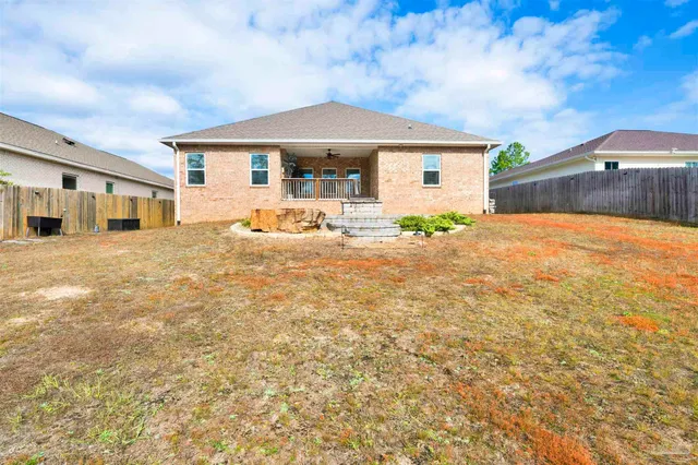 a house view with a garden space