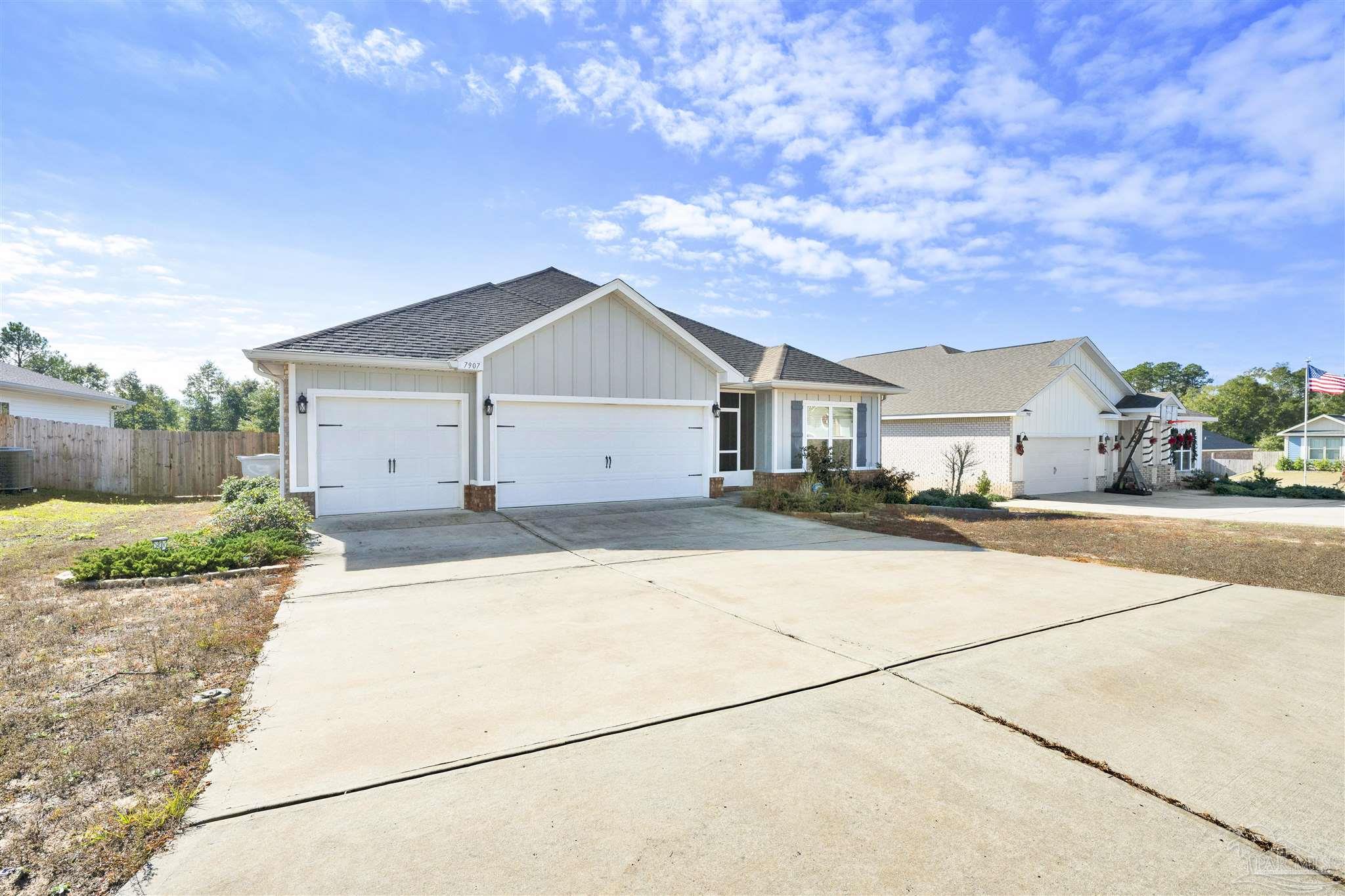 7907 Majestic Cypress Drive Milton, FL 32583 - Photo 4 of 36 a view of house with street