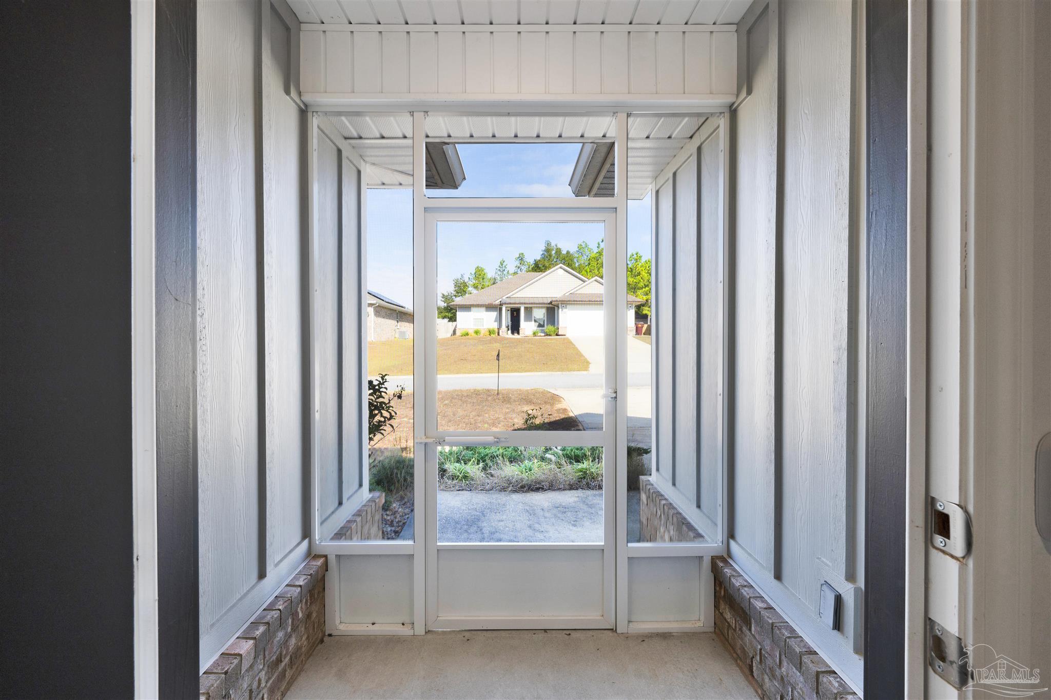 7907 Majestic Cypress Drive Milton, FL 32583 - Photo 5 of 36 a view of a porch