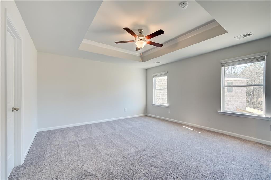 143 Dalston Cove Stockbridge, GA 30281 - Photo 22 of 32 a view of an empty room with a window