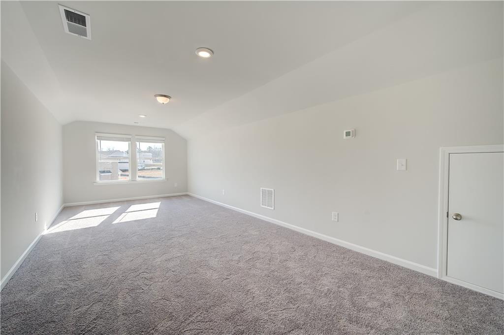 143 Dalston Cove Stockbridge, GA 30281 - Photo 28 of 32 a view of empty room with window